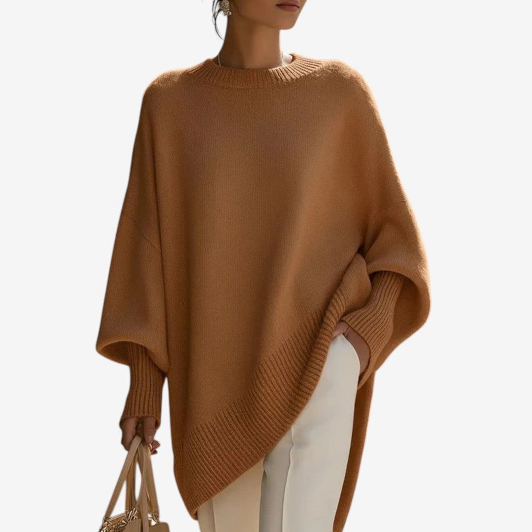 Asymmetric draped poncho sweater, brown knit with ribbed hem detail and cuffed sleeve