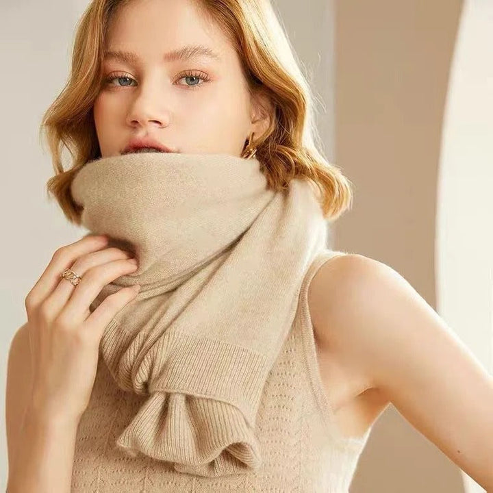 Light beige merino wool shawl styled as a wrap around the neck