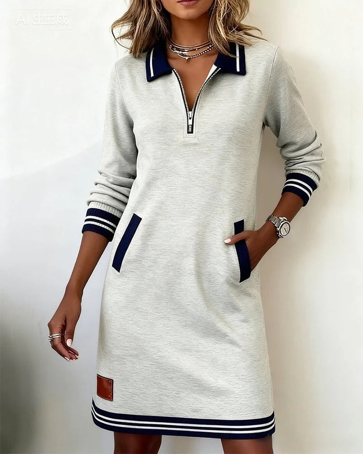 Light grey long-sleeve cotton shirt dress with quarter-zip and navy contrast trim