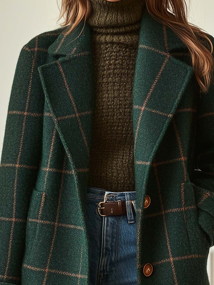 Dark green plaid coat with brown button detail and draped lapels