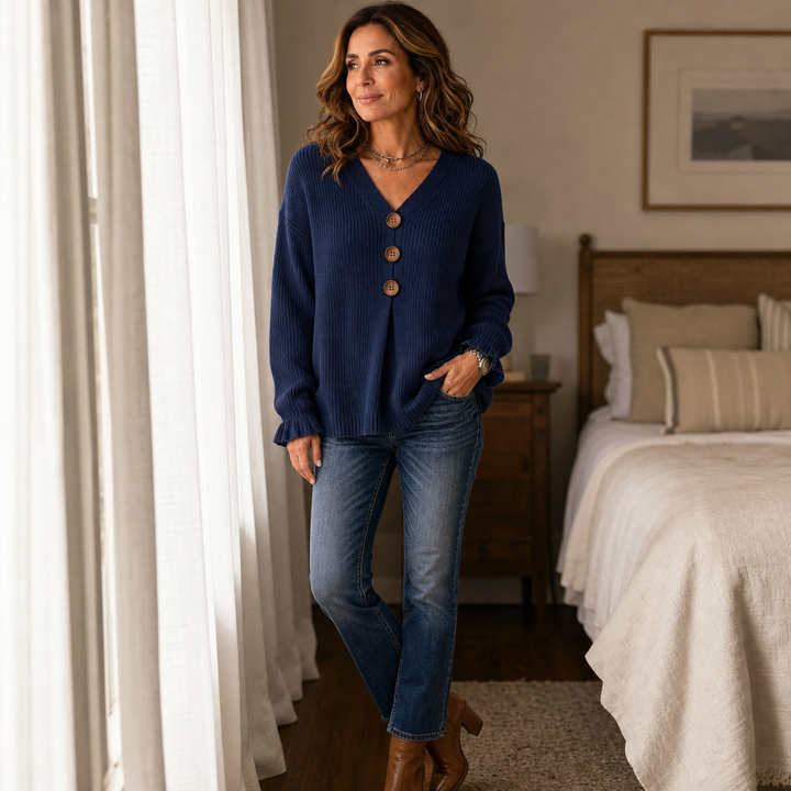 Navy V-neck ribbed knit sweater with button placket and gathered long sleeves