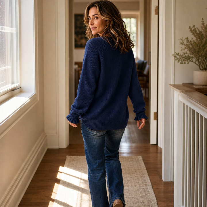 Navy V-neck ribbed knit sweater with ribbed hem and long cuffed sleeves