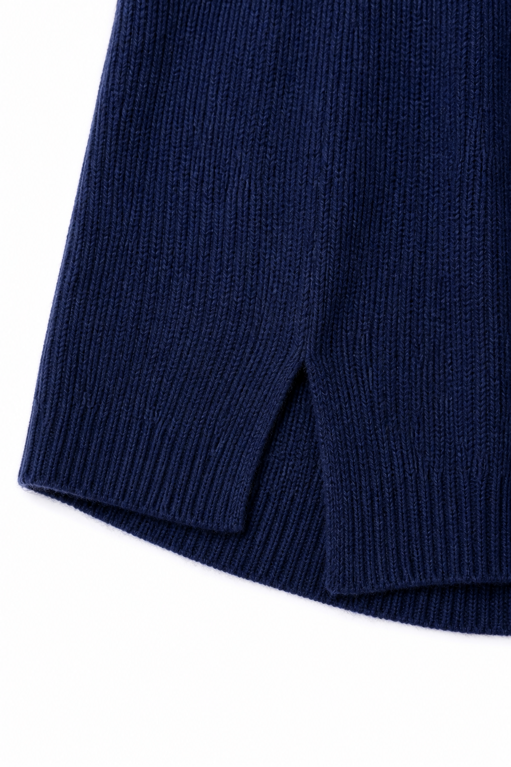 Navy ribbed knit sweater hem with side slit detail