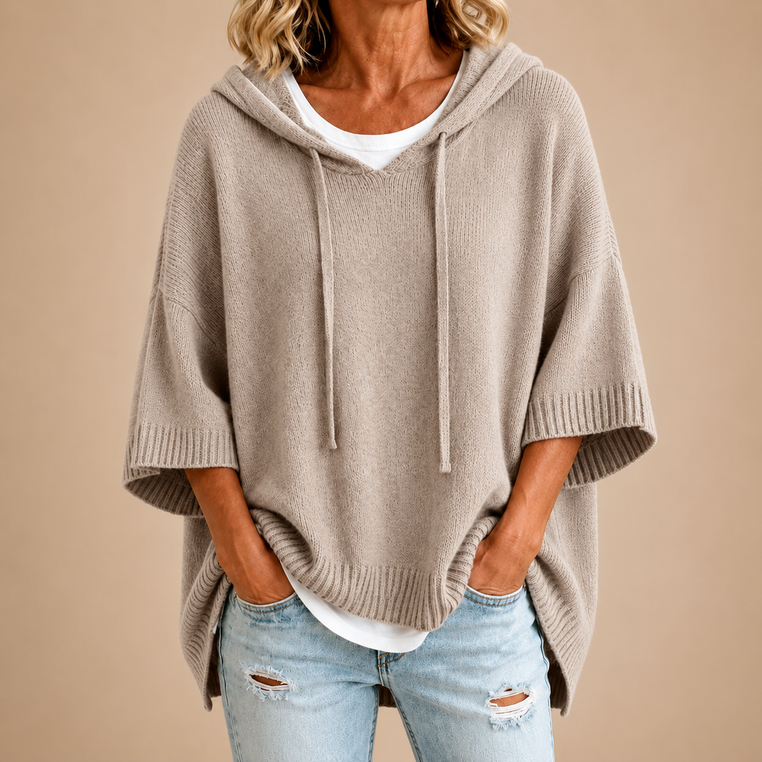 Taupe hooded knit poncho with drawstring hood and draped short sleeves