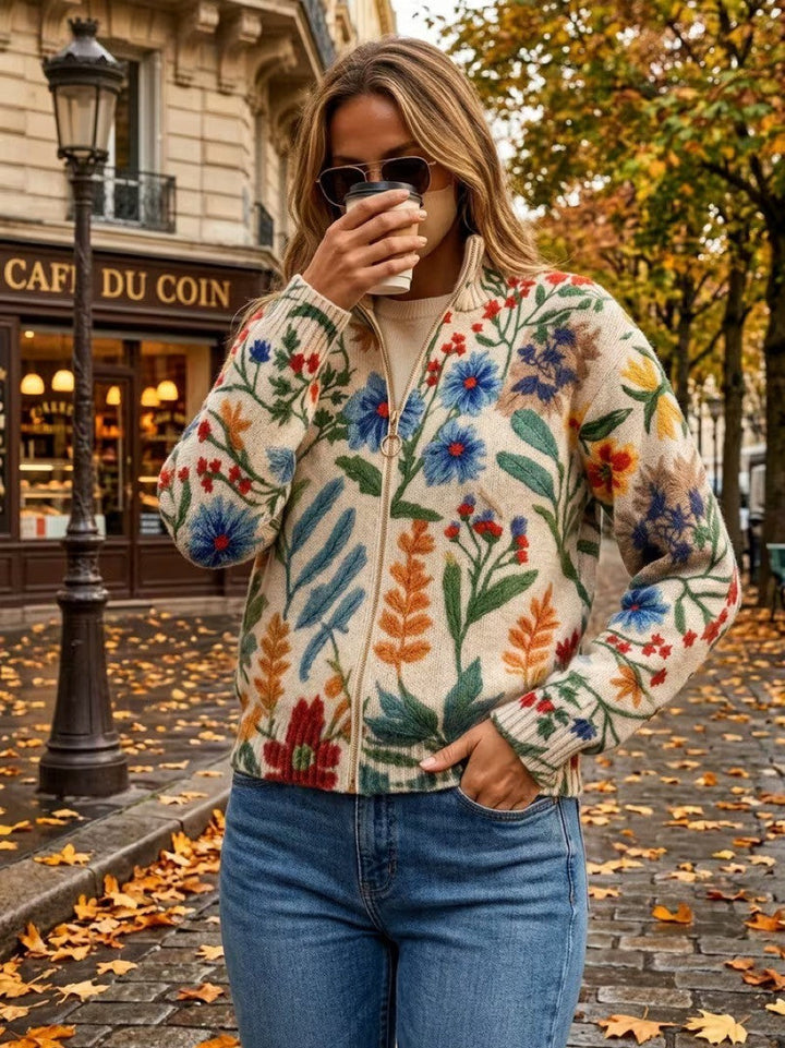 Floral zip cardigan in cream with blue and red blossoms, zip front and ribbed cuffs
