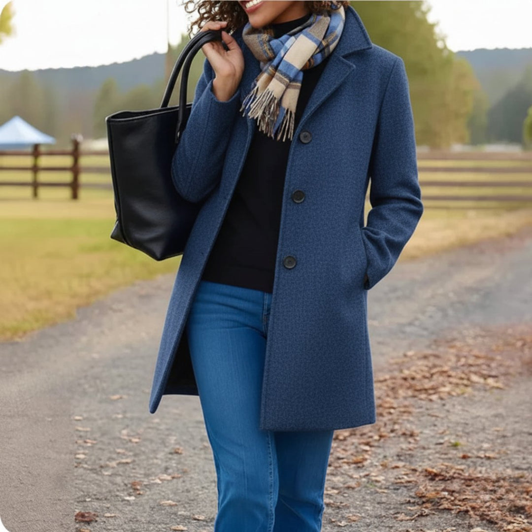 Mid-length single-breasted coat in blue with button front and notch collar