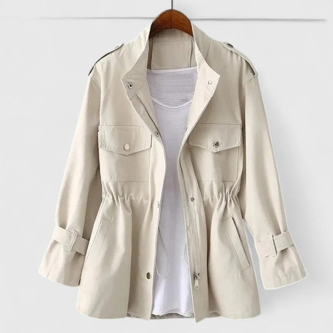 Cream utility jacket with button front, flap pockets, and tunnel-drawstring waist