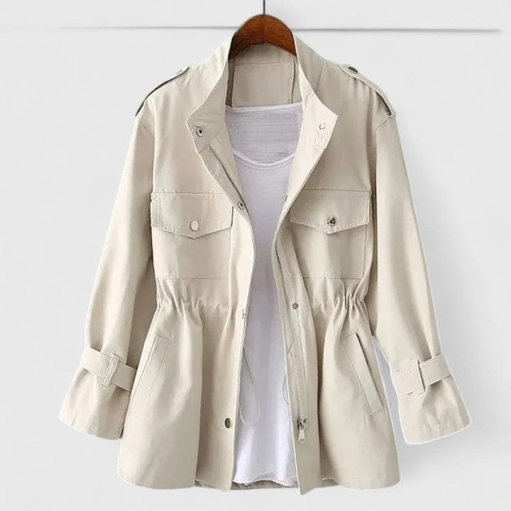 Cream utility jacket with button front, flap pockets, and tunnel-drawstring waist