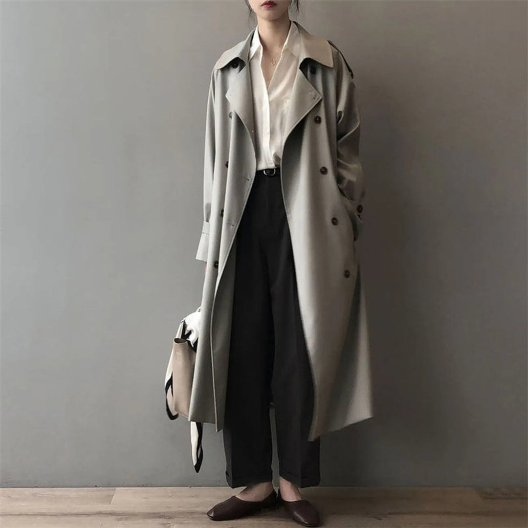 Long double-breasted trench coat, gray, notched lapels, button front, belt