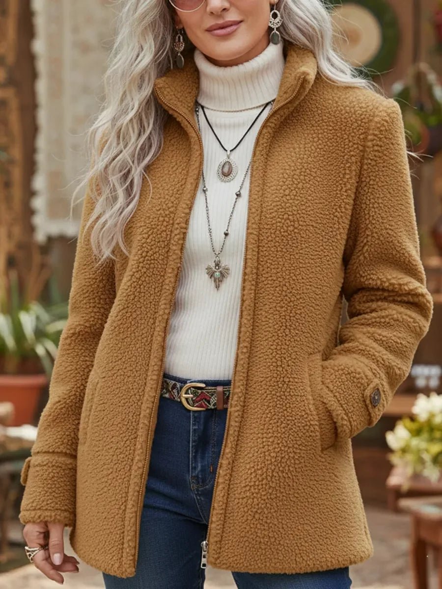 Camel sherpa-style comfort jacket with stand collar and front zip, long sleeves.