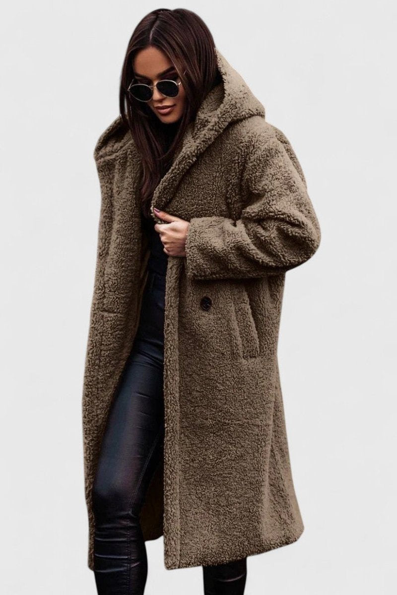Light taupe long hooded winter coat with fuzzy texture, button front and front pockets.
