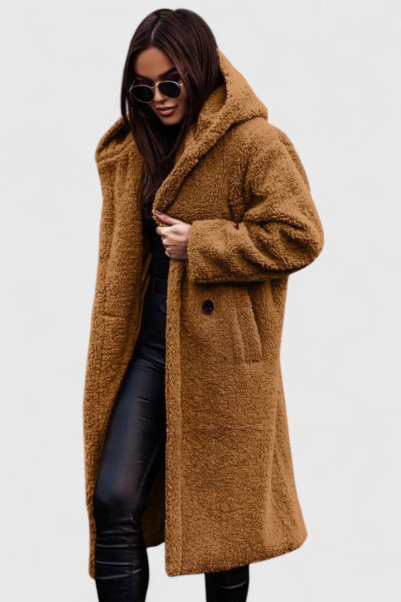 Camel tan long hooded winter coat with fuzzy texture, button front and front pockets.