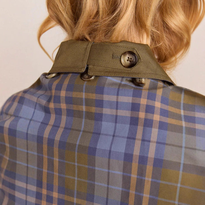 Oversized short jacket neck detail with olive-brown collar and blue plaid lining