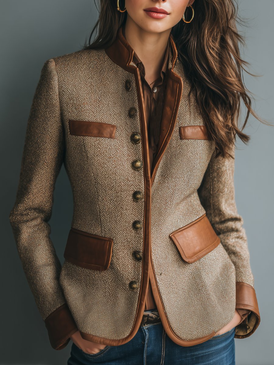 Brown herringbone blazer with leather-trimmed flap pockets and four-button front